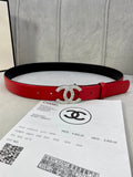 Red leather belt with Chanel gold-tone double C buckle and eyelet holes
