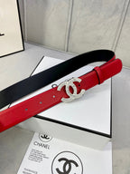 Red leather belt with Chanel gold-tone double C buckle, shown at an angle