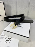 Black leather belt with rhinestone CC buckle on a flat strap