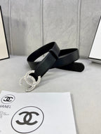 Black leather belt with rhinestone CC buckle and wide strap end