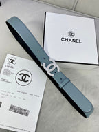 Light blue Chanel belt with silver CC buckle and punched adjustment holes.