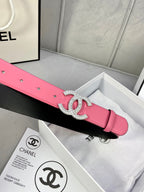 Chanel belt with pink leather and rhinestone CC buckle on a black-lined strap