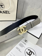 Chanel belt with light gray leather strap, gold-tone CC buckle, and dark underside