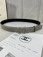 Grey leather belt with blue-and-gold CC logo buckle detail
