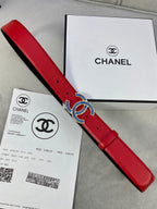 Long red leather belt with blue-and-gold CC logo buckle and adjustable pin holes