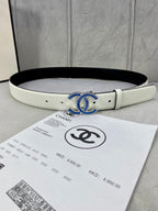 Chanel belt with light leather strap and blue jeweled CC buckle