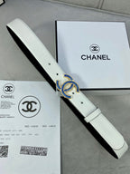Chanel belt with light strap, blue jeweled CC buckle and punched holes