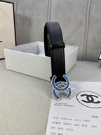 Chanel black leather belt with blue and gold CC logo buckle, front view
