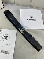 Chanel black leather belt with blue and gold CC logo buckle, angled side