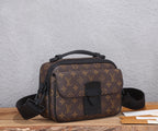 Louis Vuitton monogram crossbody bag angled view, with front emblem and adjustable strap