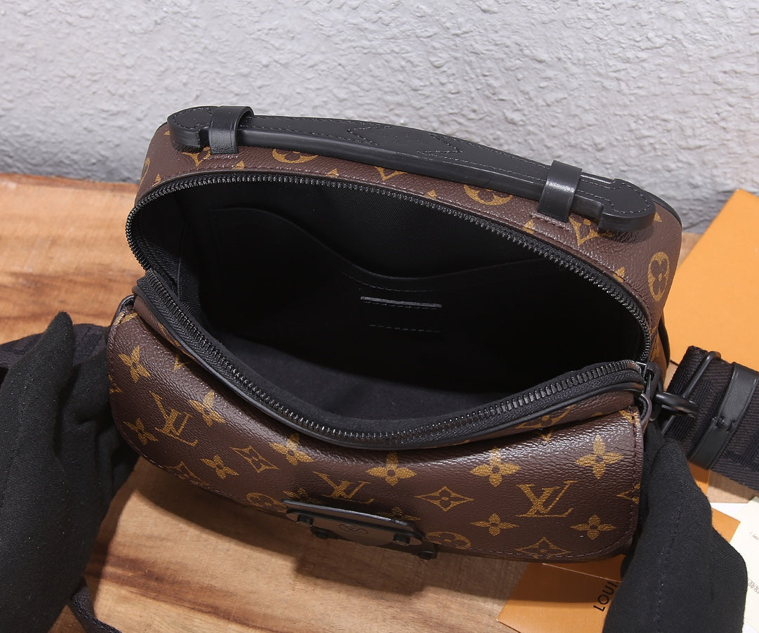 Louis Vuitton monogram crossbody bag open with black interior and zipper edge