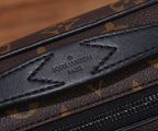 Louis Vuitton monogram bag leather strap with embossed “Louis Vuitton Paris” text