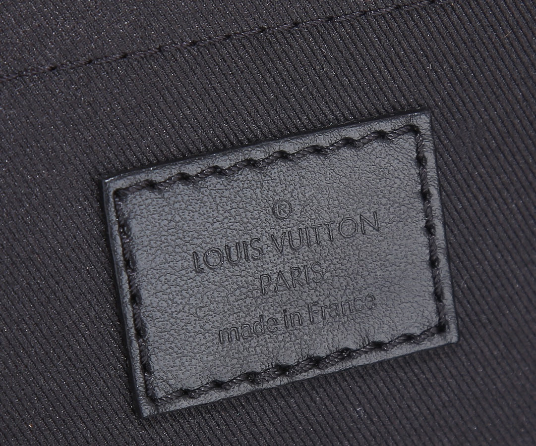Louis Vuitton Paris label on interior tab with “made in France” text