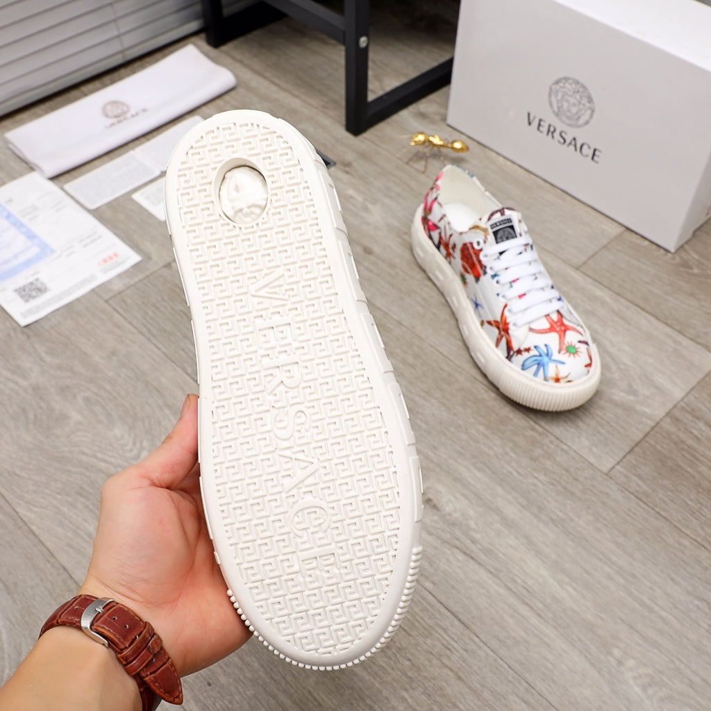White sneaker outsole with textured tread pattern and logo-style emboss.