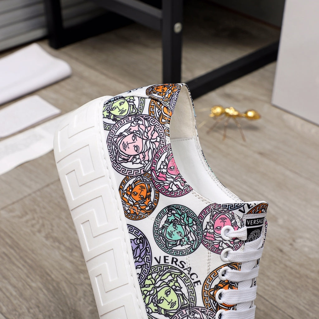 Versace sneakers side view with multicolor print fabric upper and white rubber sole