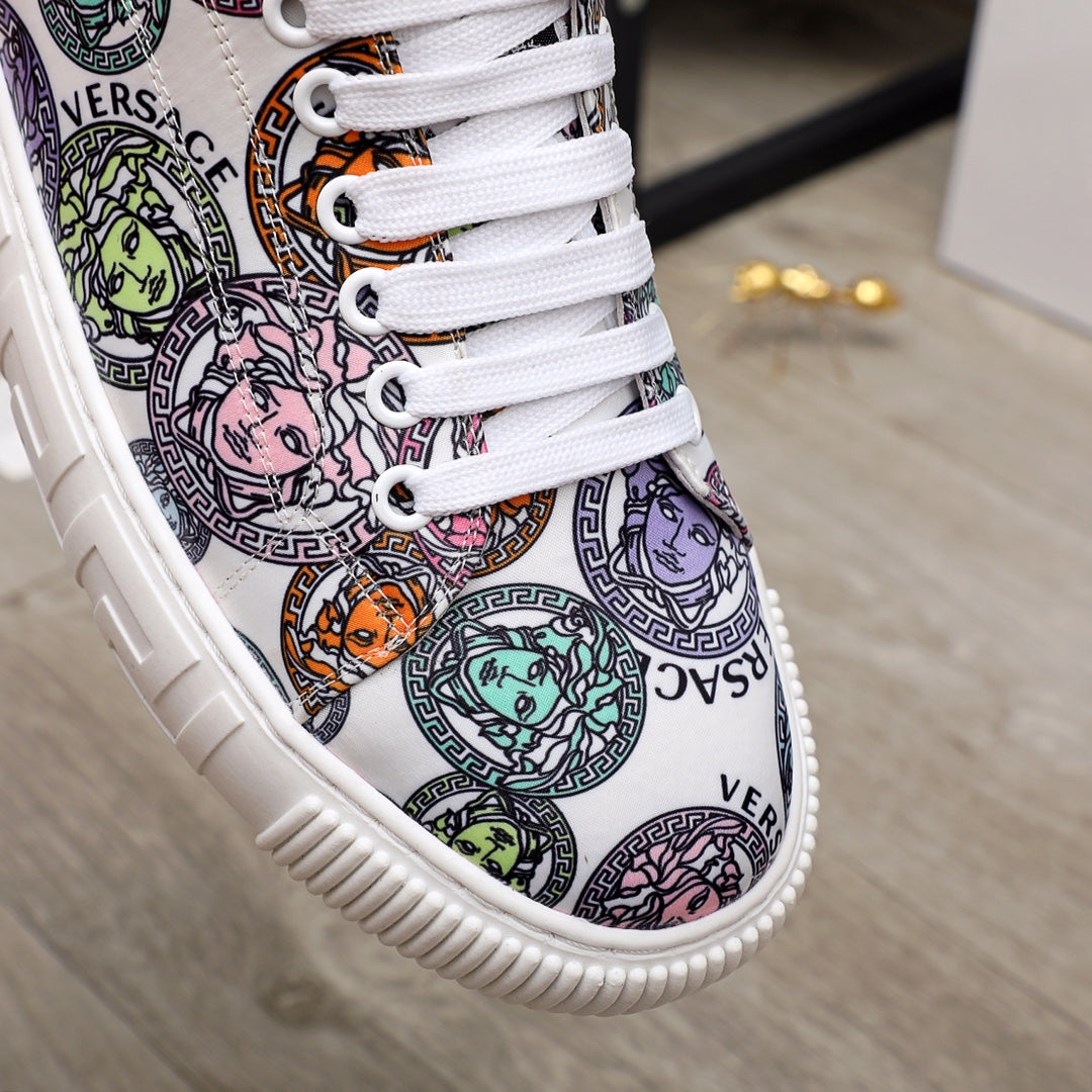 Versace sneakers close-up of multicolor patterned upper with white lace-up trim