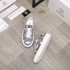 Versace sneakers, pair shown: multicolor printed canvas upper with white laces