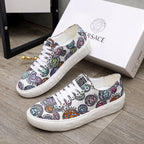 Versace sneakers, multicolor patterned upper with white rubber sole and lace-up front