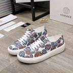 Versace sneakers in white with multicolor logo and character print, white laces