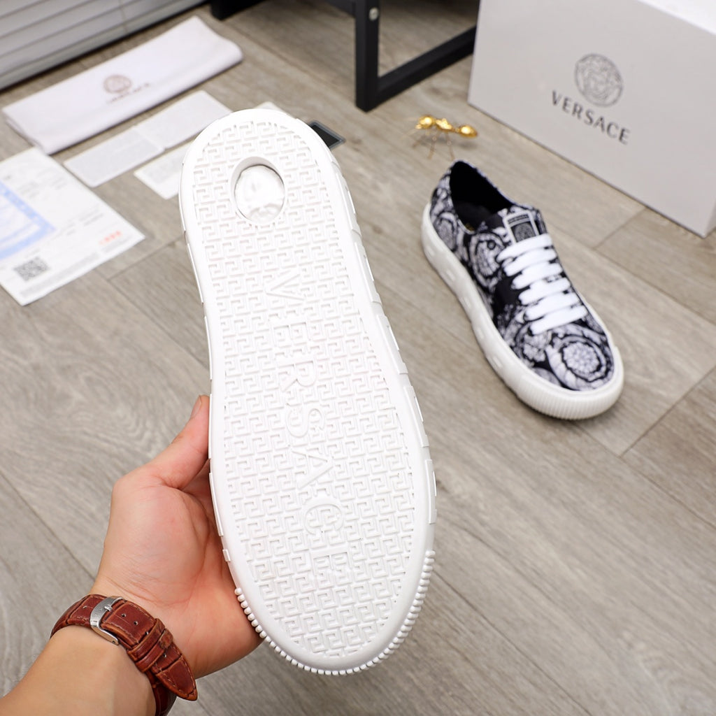 Versace luxury sneakers, outsole view, textured white rubber sole