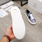 Versace luxury sneakers, outsole view, textured white rubber sole