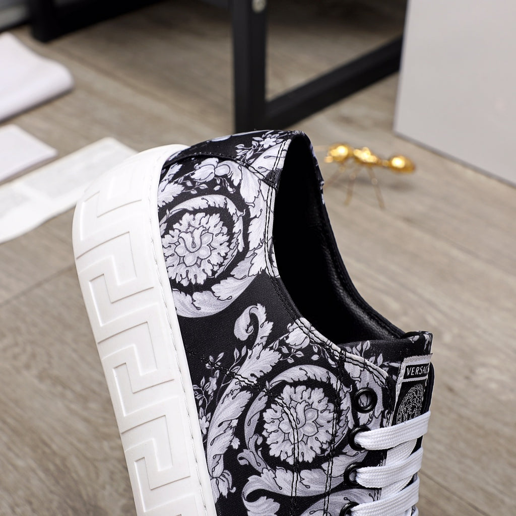 Versace luxury sneakers, quarter view, black-and-white baroque canvas and white laces