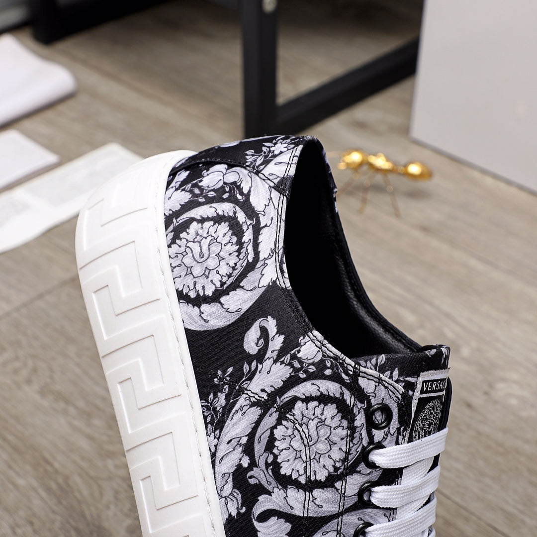 Versace luxury sneakers, quarter view, black-and-white baroque canvas and white laces
