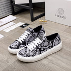 Versace luxury sneakers, black and white baroque print, white laces and rubber sole