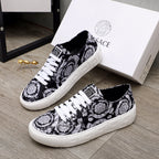 Versace luxury sneakers with black-and-white baroque pattern, white laces, low profile sole