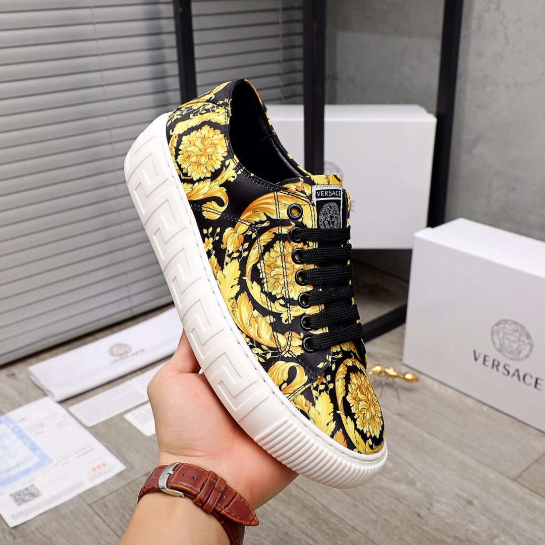 Versace luxury sneakers, black and gold baroque print, lace-up low top, white platform sole