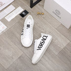 White Versace lace-up sneakers with black VERSACE logo on side