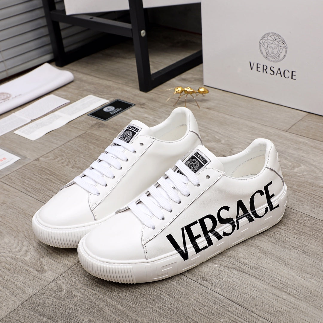 White Versace sneakers, lace-up, black VERSACE logo on side, textured sole