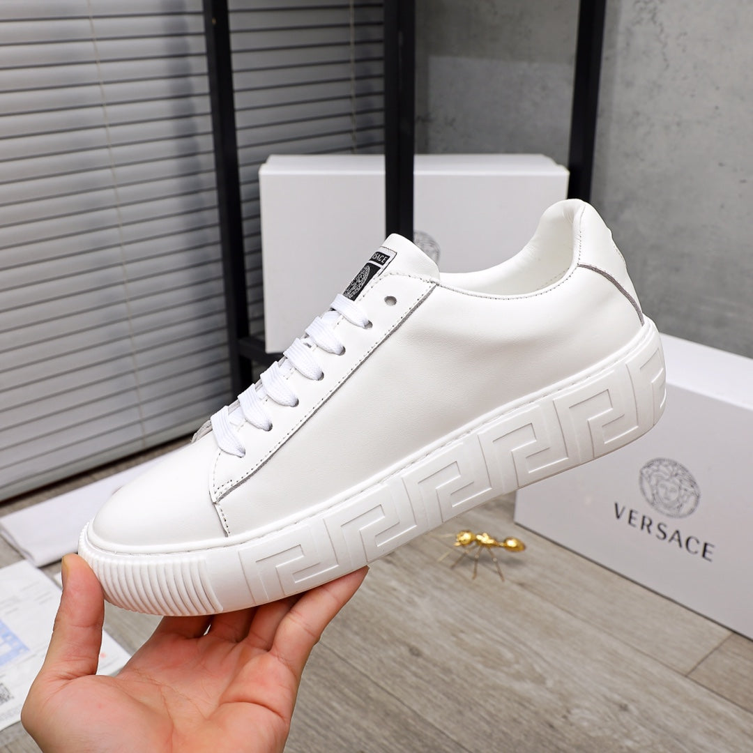 White Versace sneakers with geometric embossed sole, lace-up front