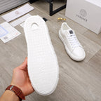White Versace sneakers outsole view with textured tread underside