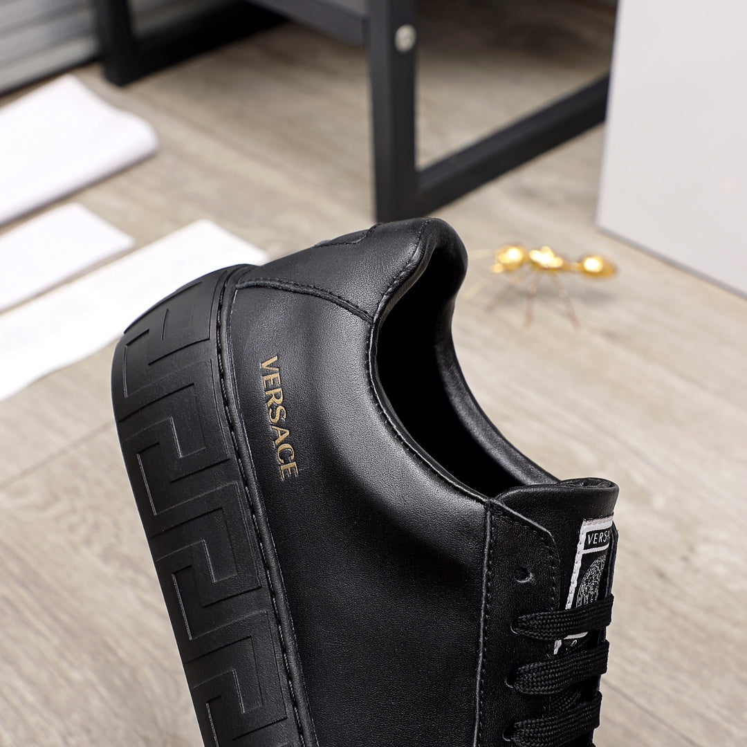 Versace black leather sneaker heel and side, cushioned collar and lace tab