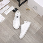 Versace white lace-up sneakers with low profile and cushioned outsole, top and side view
