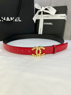 Red Chanel belt with embossed leather-look strap and gold circular CHANEL buckle