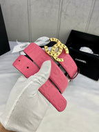 Pink Chanel belt with gold round logo buckle and adjustable strap holes
