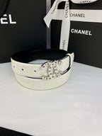 White Chanel belt with circular gold buckle, wide flat strap