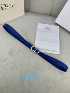 Blue Dior belt with CD logo buckle, shown diagonally with receipt card.