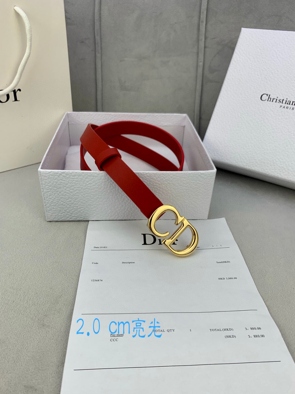 Dior red belt with CD buckle in a white gift box