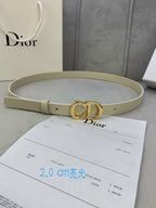 Light beige leather belt with gold-tone CD buckle and adjustable hole strap