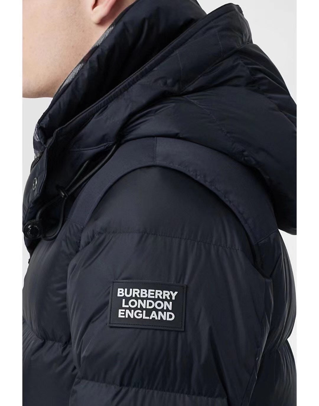 Burberry long puffer jacket shoulder patch reading Burberry London England
