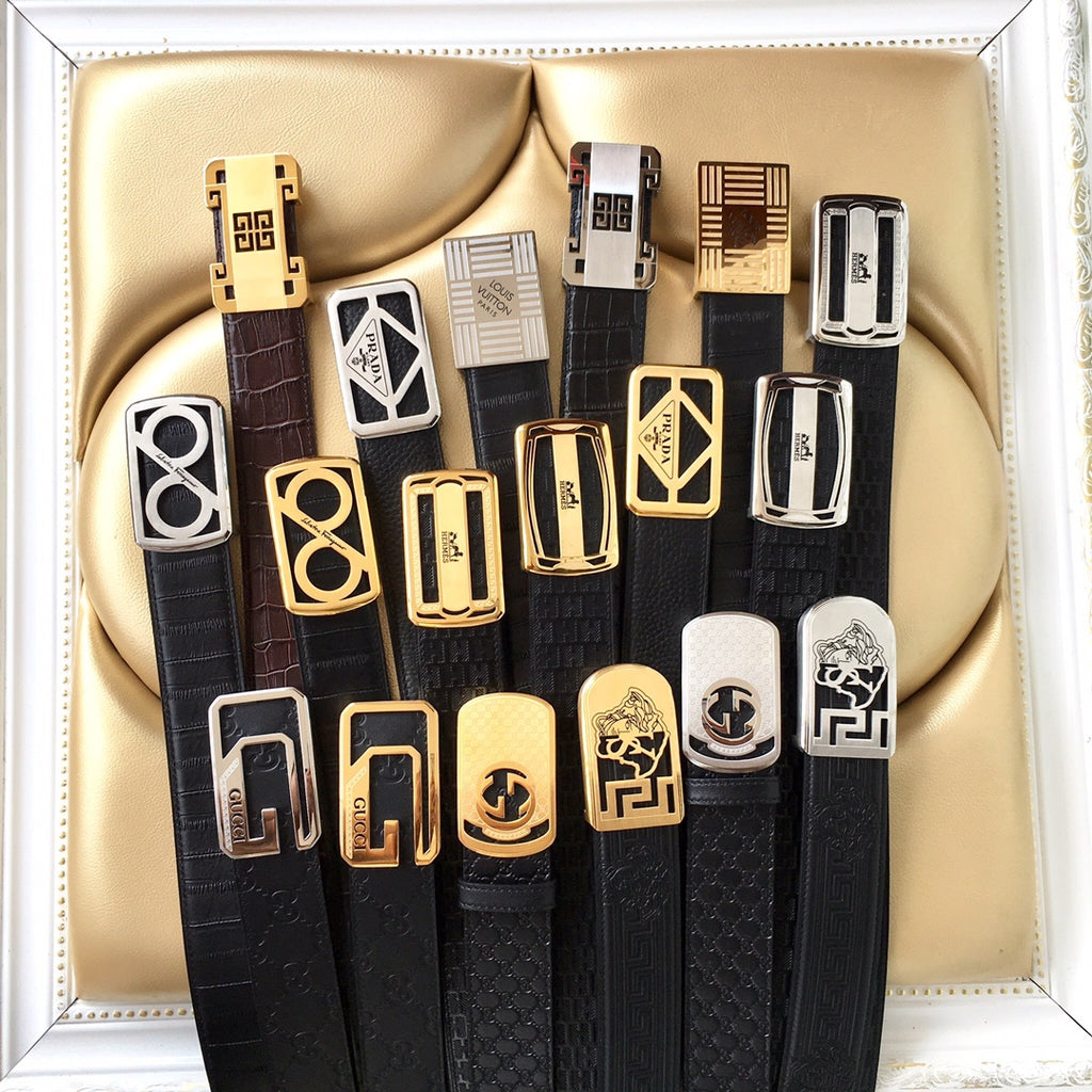 Prada belt assortment in box: multiple black leather straps with gold-tone buckles