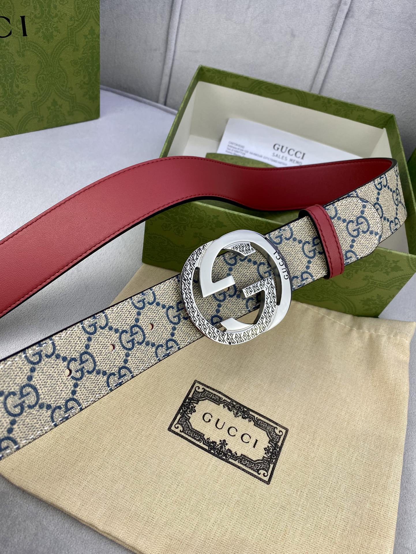 Logo-print belt with red leather strap and silver GG-style round buckle