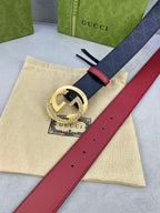 Gucci belt with red strap and dark monogram leather, gold-tone buckle front