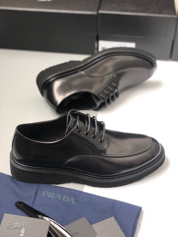 Prada unisex lace-up shoes, black leather, low profile with raised welt edge