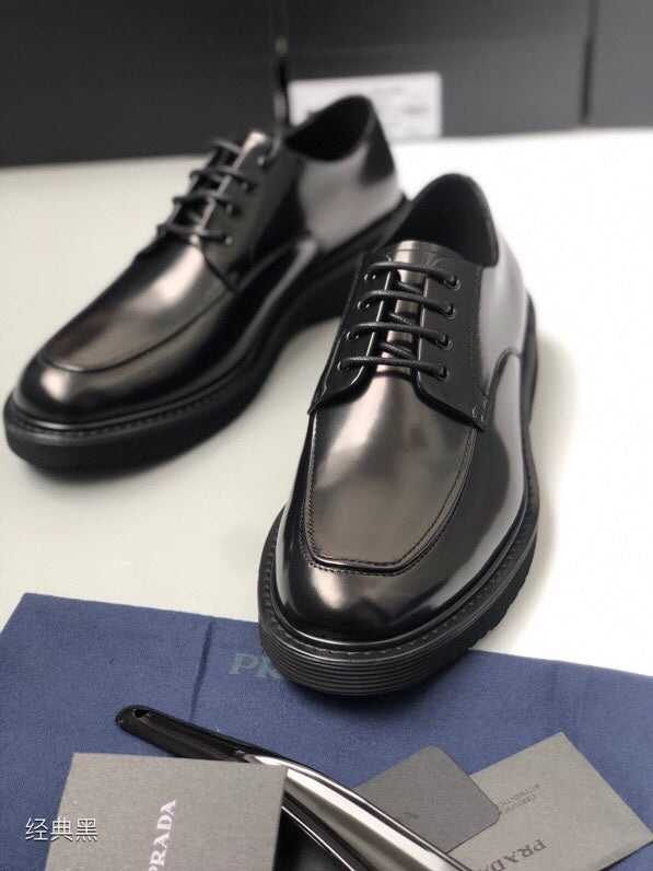Prada unisex oxford shoes, black leather, laces and stitched panel detail