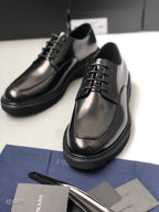Prada unisex oxford shoes, black leather, laces and stitched panel detail
