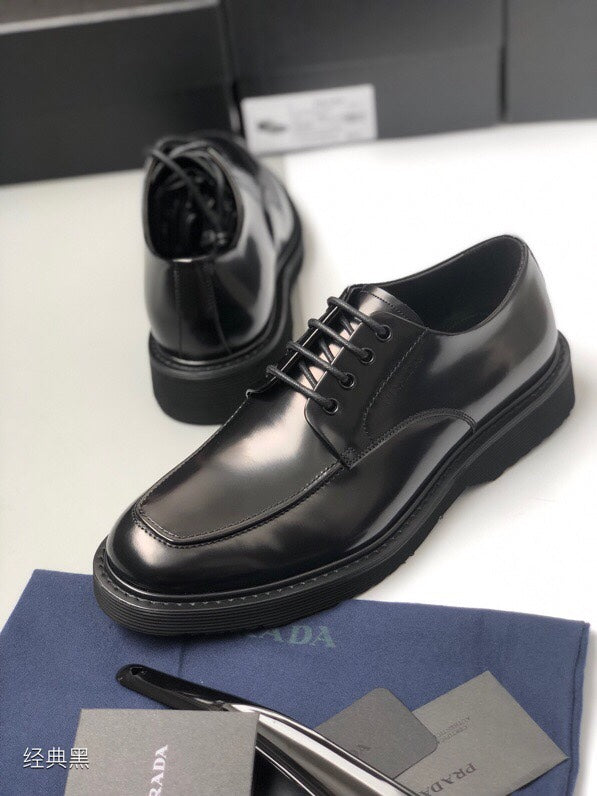 Prada unisex lace-up shoes, black leather, thick tread sole and lace-up front